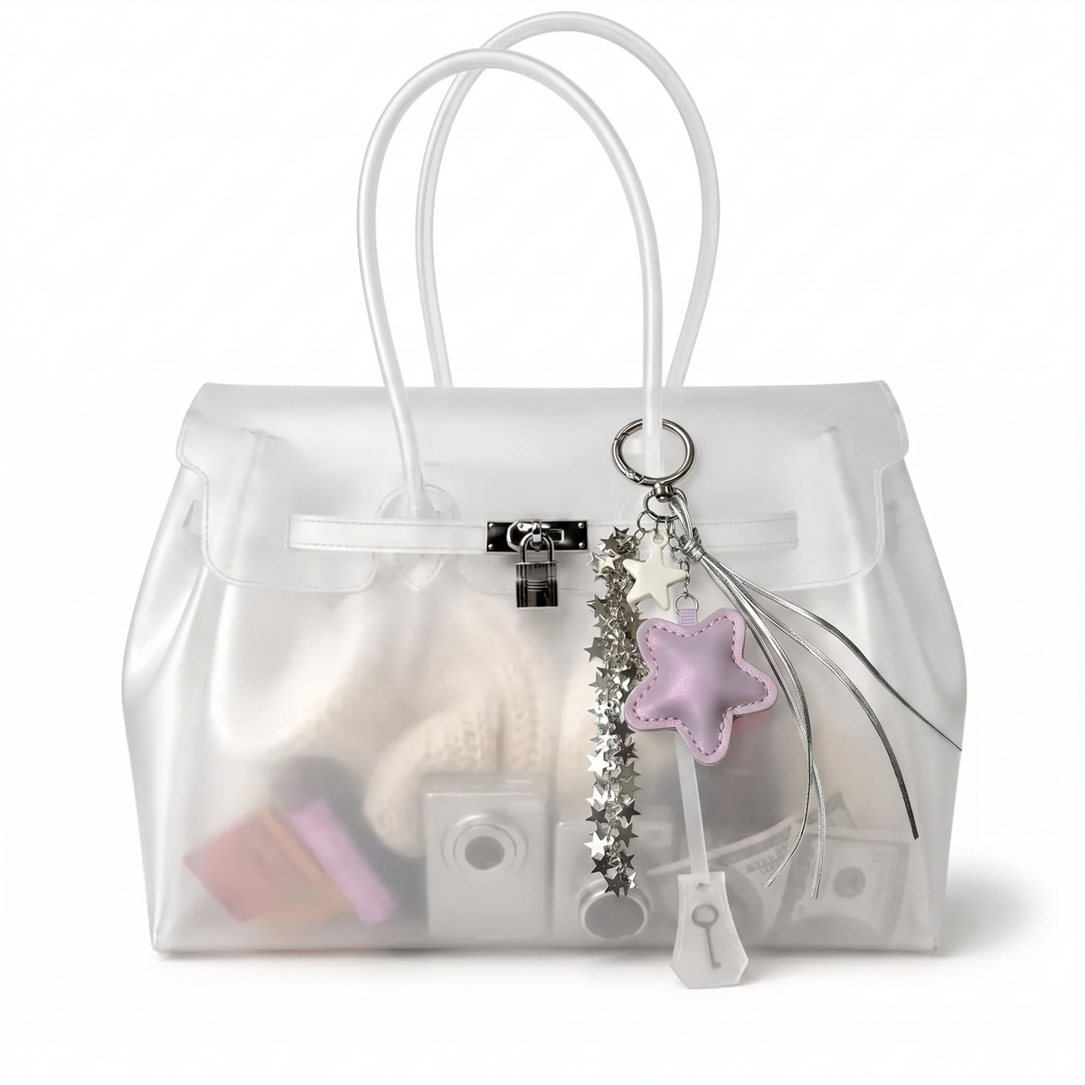 Charm étoile coloris Violet suspendu à l'anse du sac Jelly transparent