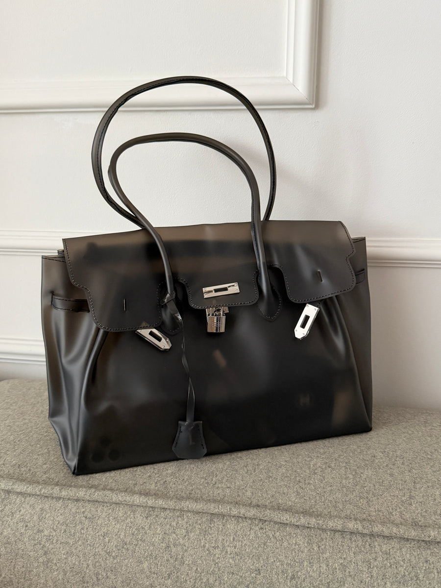 Sac cabas Jelly Firkin semi-transparent porté en extérieur, Le MAGA édit