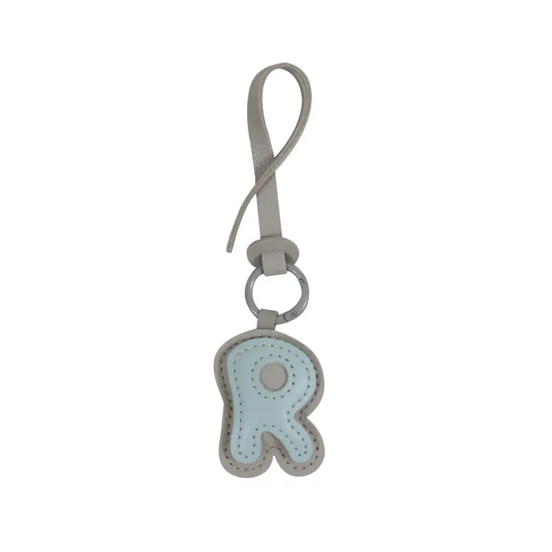 Charm lettre R effet cuir, duo de couleurs Ciel