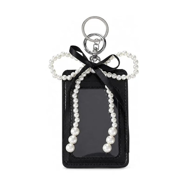 Porte-cartes en cuir, nœud perlé, l'étui qui se porte comme un bijou, coloris Noir · nœud noir
