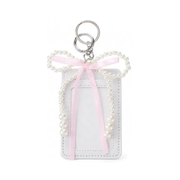 Porte-cartes en cuir, nœud perlé, l'étui qui se porte comme un bijou, coloris Blanc · nœud rose