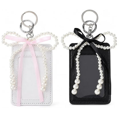 Les deux coloris du porte-cartes noeud perle, blanc et noir, cote a cote
