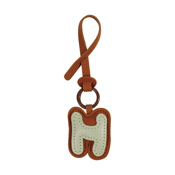 Charm lettre en cuir, le bijou de sac à ton initiale, coloris H · Vanille