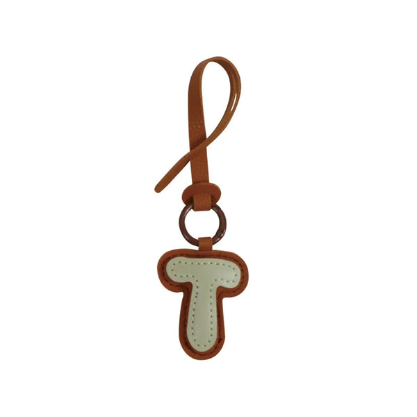 Charm lettre en cuir, le bijou de sac à ton initiale, coloris T · Vanille