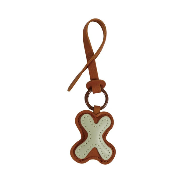 Charm lettre en cuir, le bijou de sac à ton initiale, coloris X · Vanille
