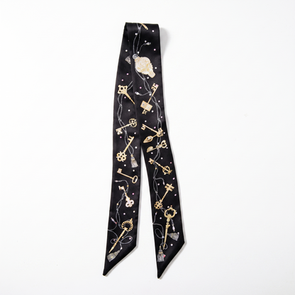 Foulard d anse en satin motif Uma, ruban a nouer sur l anse d un sac