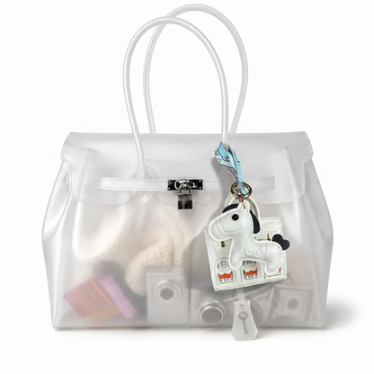 Mini Jelly coloris Blanc suspendu à l'anse du sac Jelly transparent