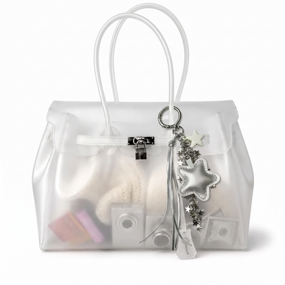 Charm étoile coloris Argenté suspendu à l'anse du sac Jelly transparent