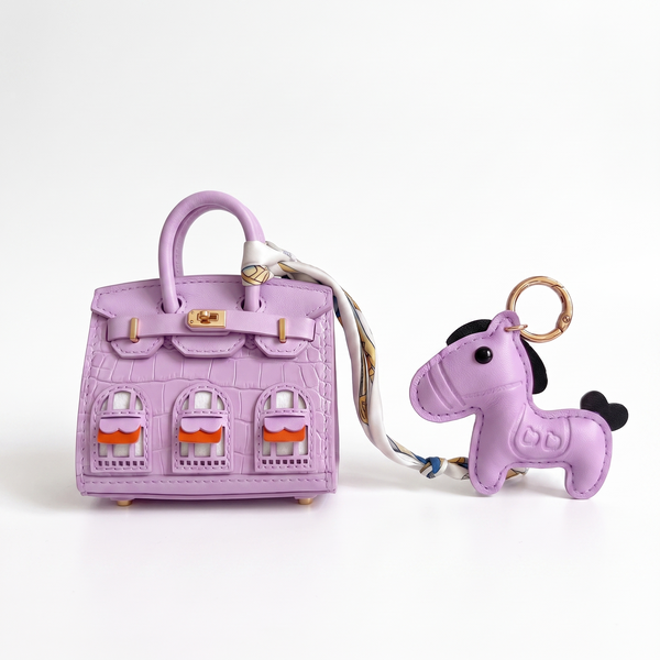 Mini Jelly, l'étui à écouteurs maison et son poney, coloris Violet