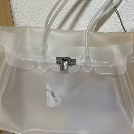 Sac Jelly Firkin transparent reçu par une cliente